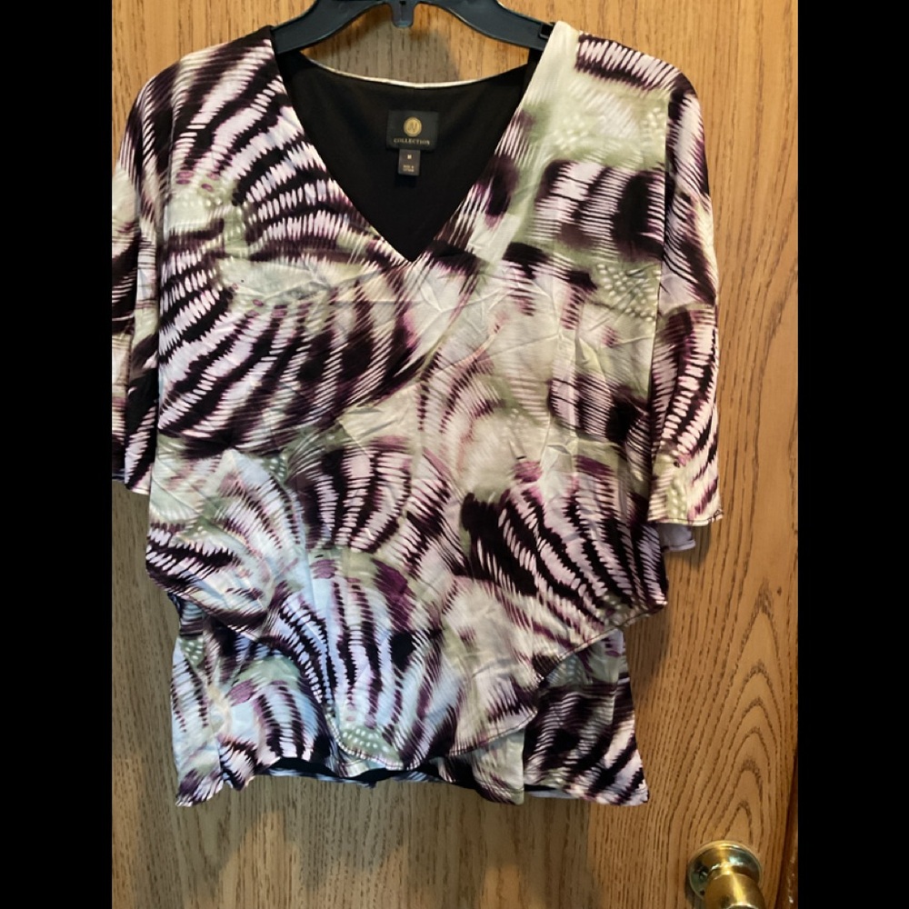 Top with draped outer shell